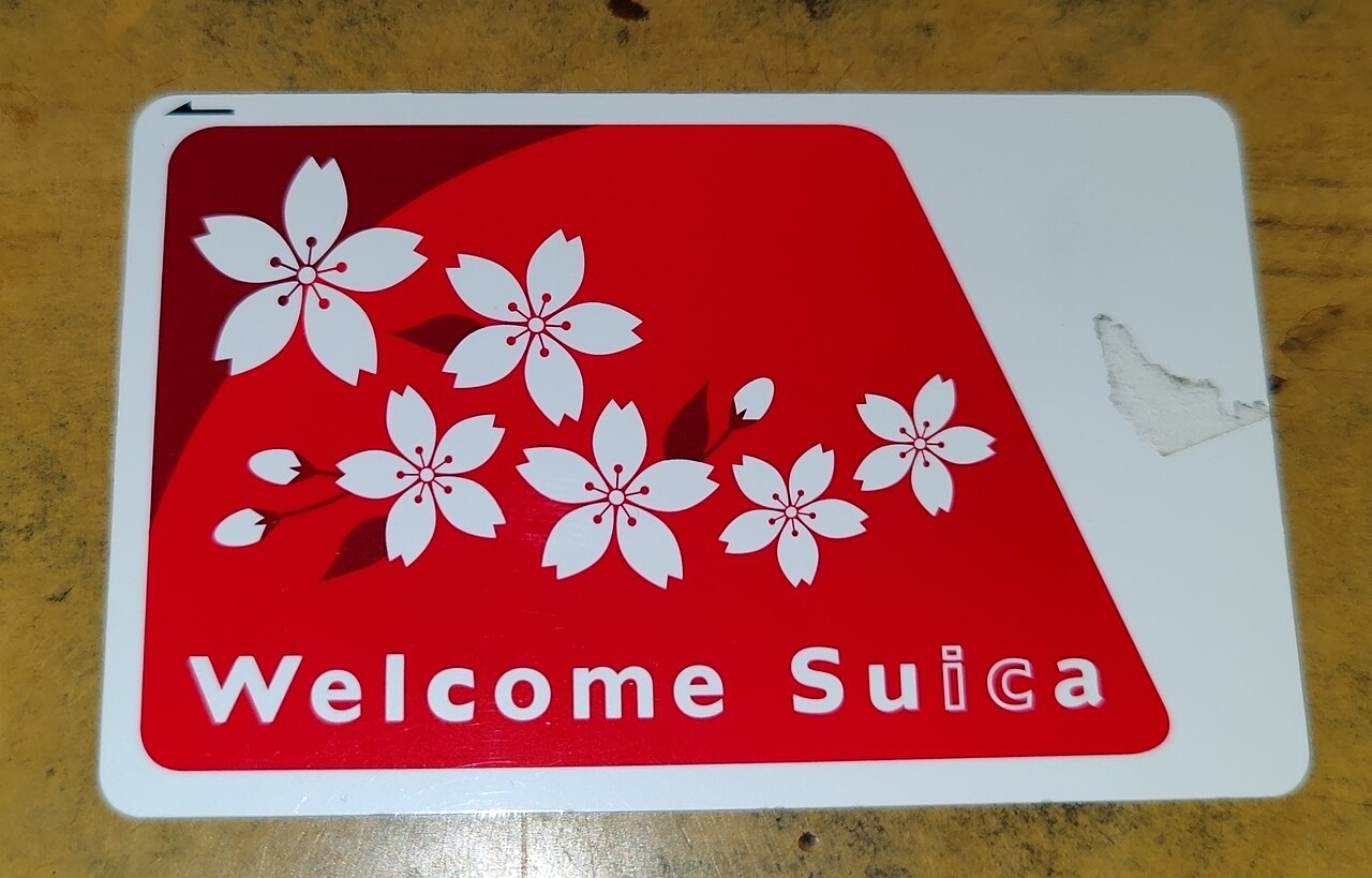 Червона картка Welcome Suica з пінгвіном Suica — туристична версія IC-картки для іноземців в Японії
